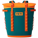 Yeti Hopper M20 Soft Backpack Cooler - A large, dark green cooler with a yellow zipper and handle on top.