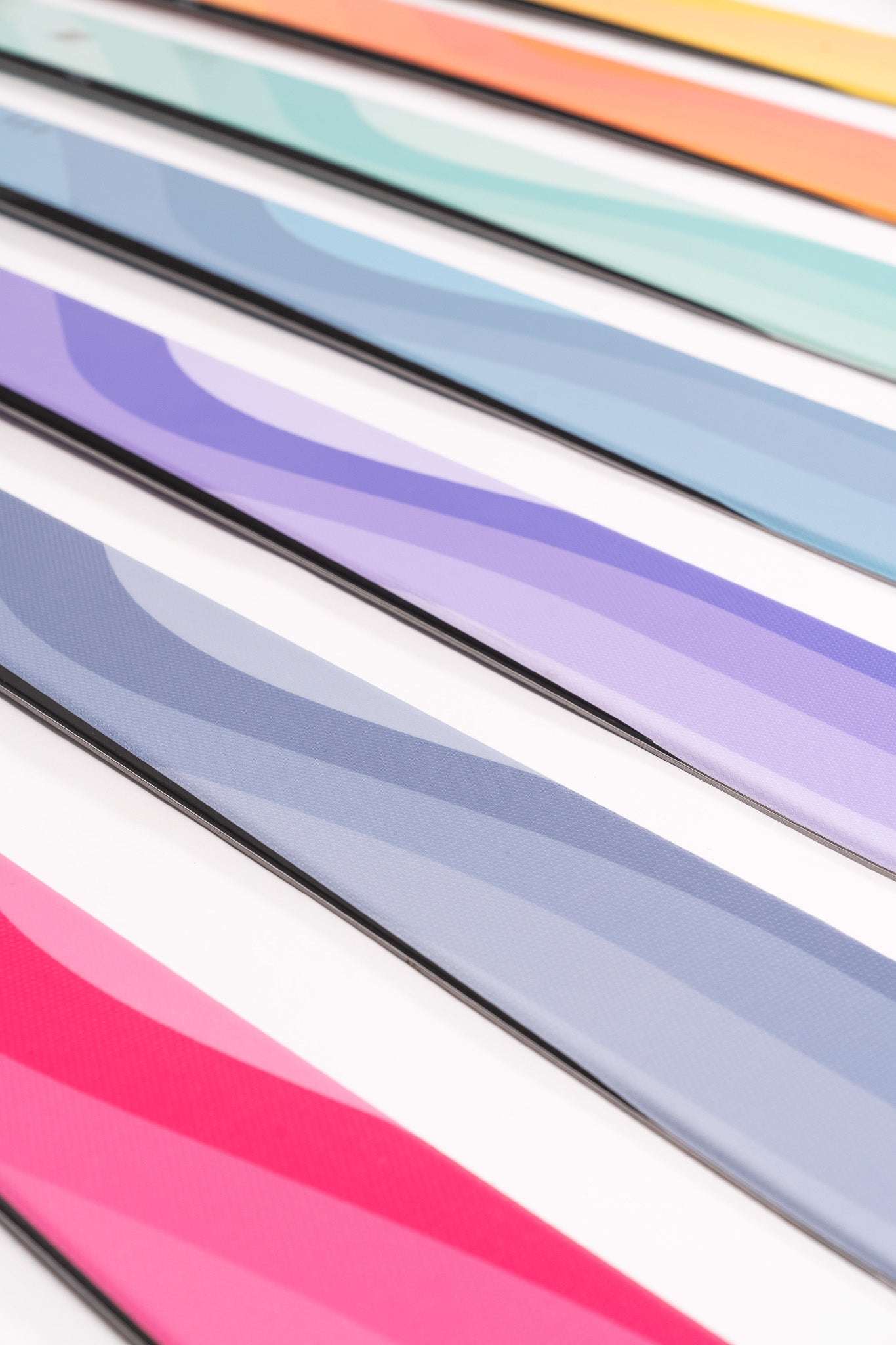 Faction Dancer 2 Ski 2026 - A pair of skis with a white base and blue stripes on top.