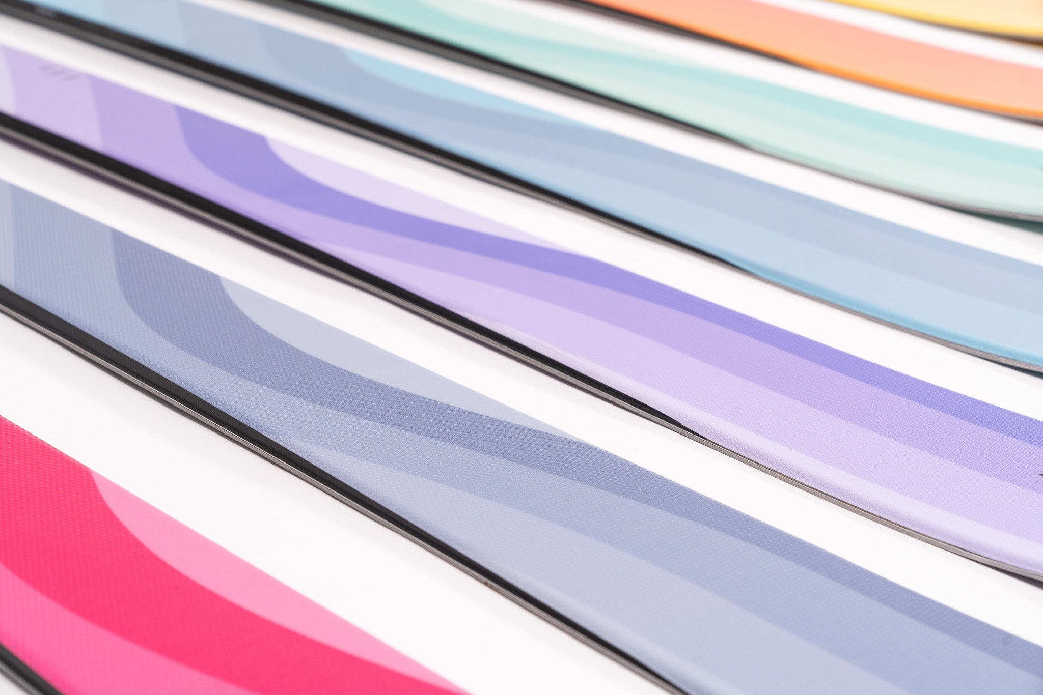 Faction Dancer 2 Ski 2026 - A pair of skis with a predominantly white base and black edges, featuring a subtle purple stripe along the top edge.