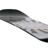 Rome Mechanic Snowboard 2025 - A snowboard with a black top sheet and light blue accents, featuring a geometric pattern of dark gray shapes.