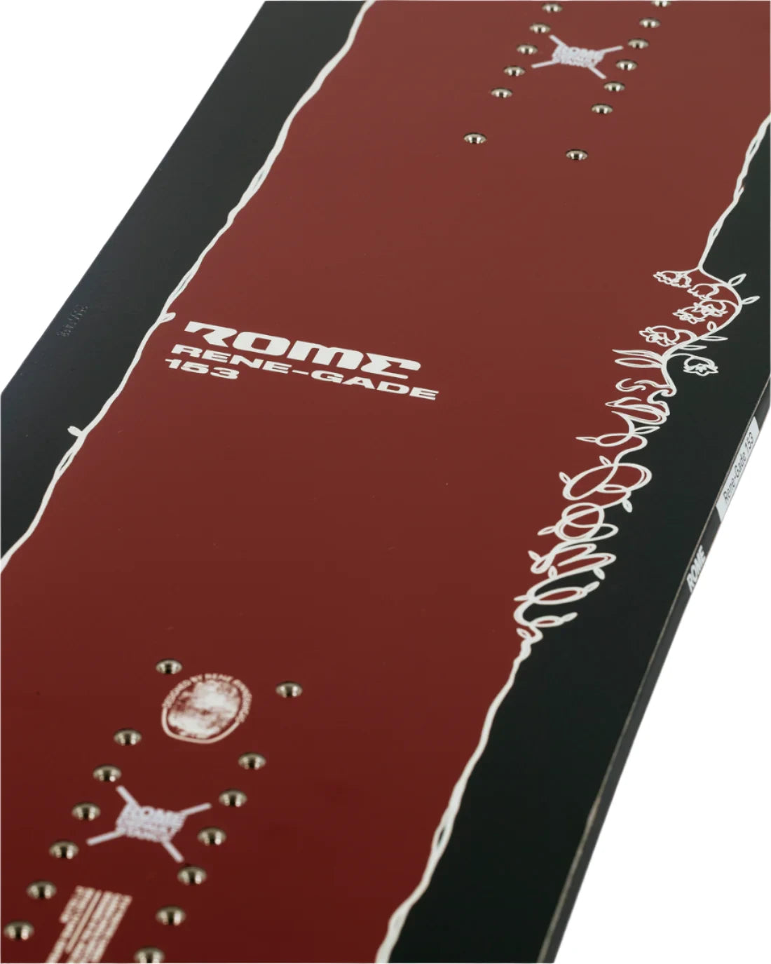 Rome Renegade - Snowboard with a maroon top sheet featuring white floral pattern and silver rivets along the edges.