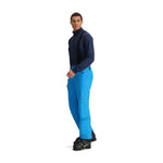 Obermeyer Force Insulated Suspender Pant 2025 - A pair of bright blue snow pants with black suspenders and a zippered pocket on the thigh.