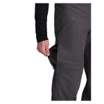 Obermeyer Foraker Shell Pant 2025 - Black pants with a zippered pocket on the thigh and a black zipper running down the side of the leg.