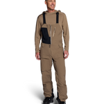 Men's mushroom shell bib pants with dark navy panels and adjustable suspenders