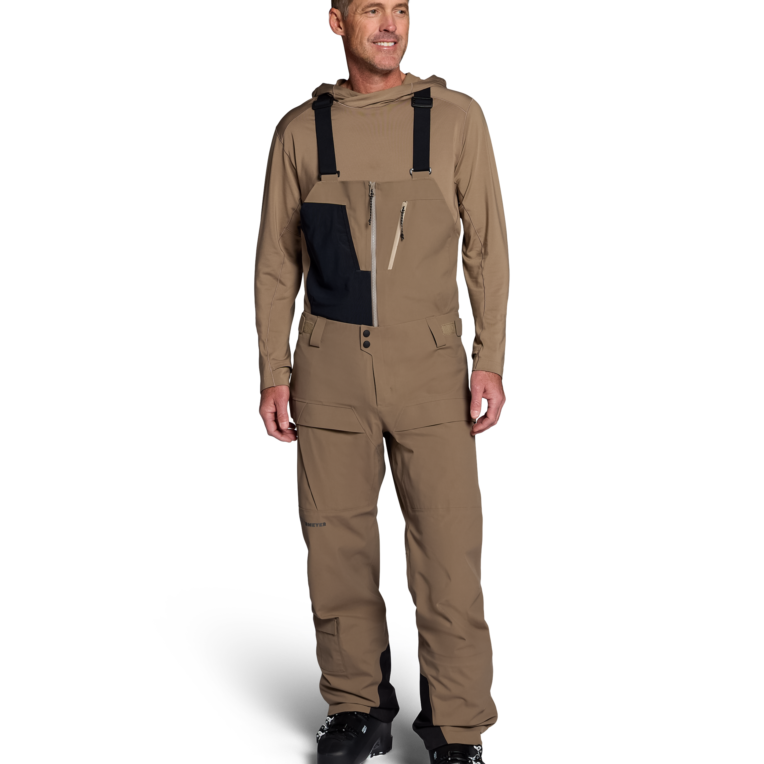 Men's mushroom shell bib pants with dark navy panels and adjustable suspenders