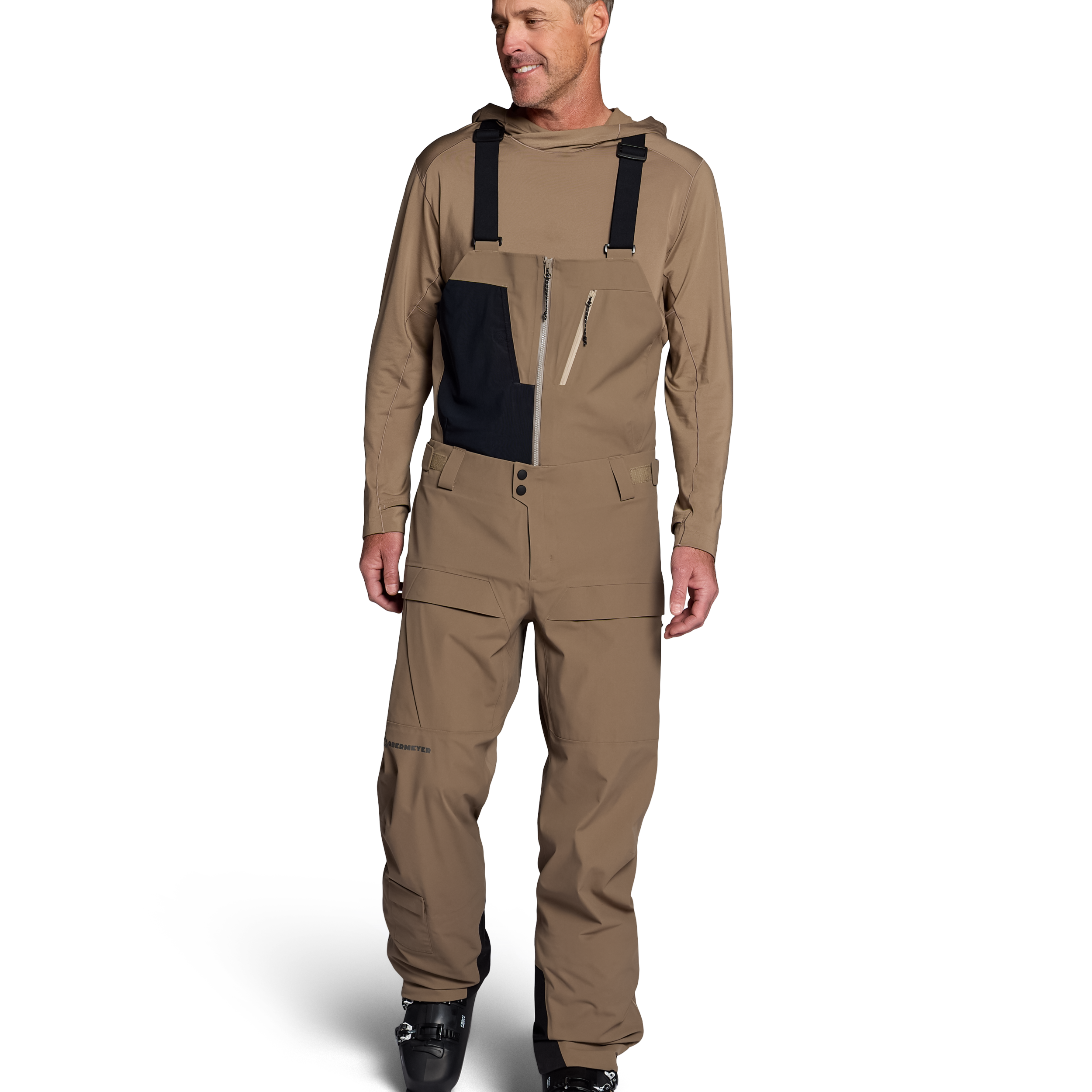 Men's mushroom shell bib pants with dark navy chest panel and adjustable straps