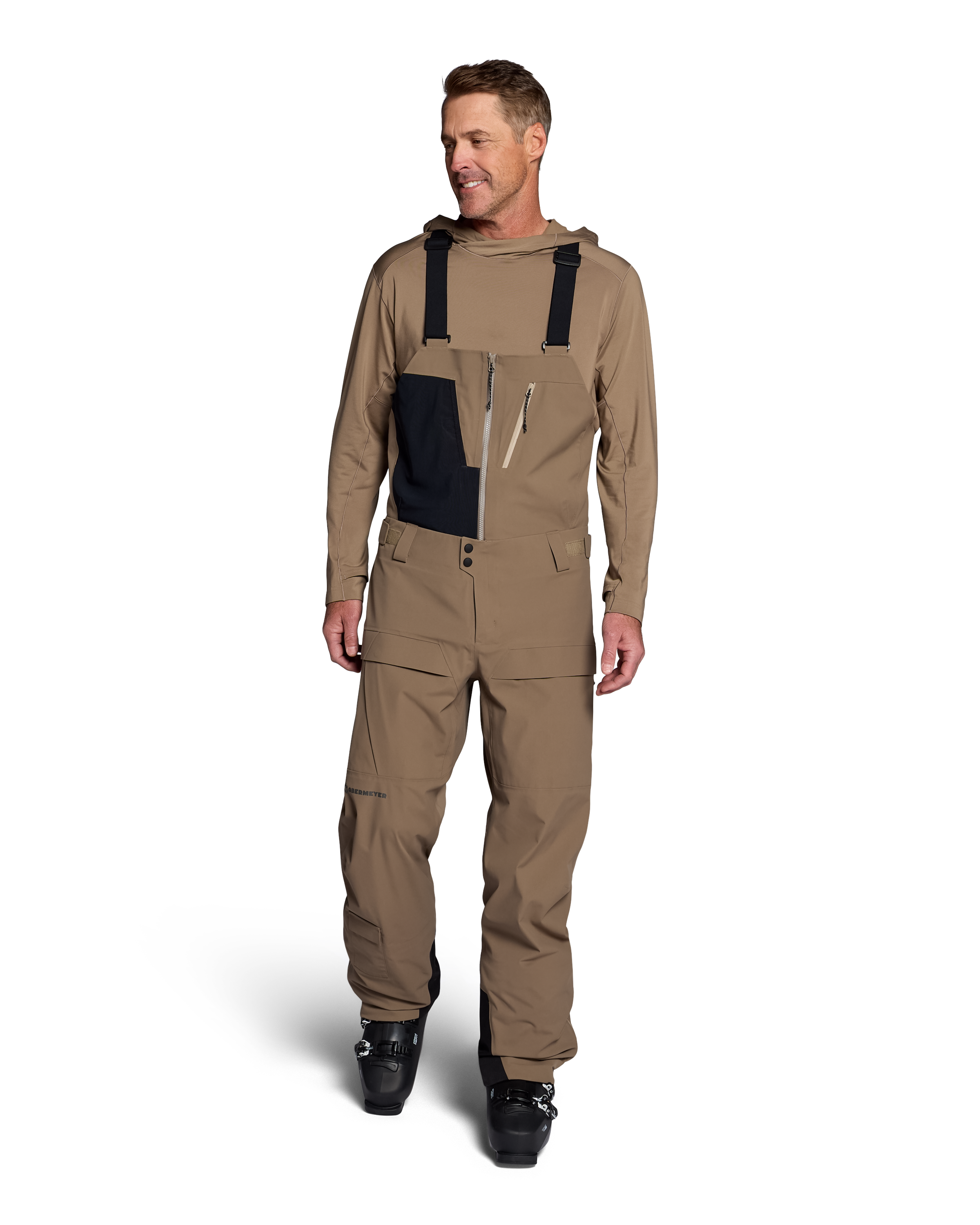 Men's mushroom shell bib pants with dark navy chest panel and adjustable straps