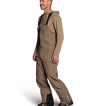 Men's mushroom shell bib pants with dark navy side bib and adjustable straps