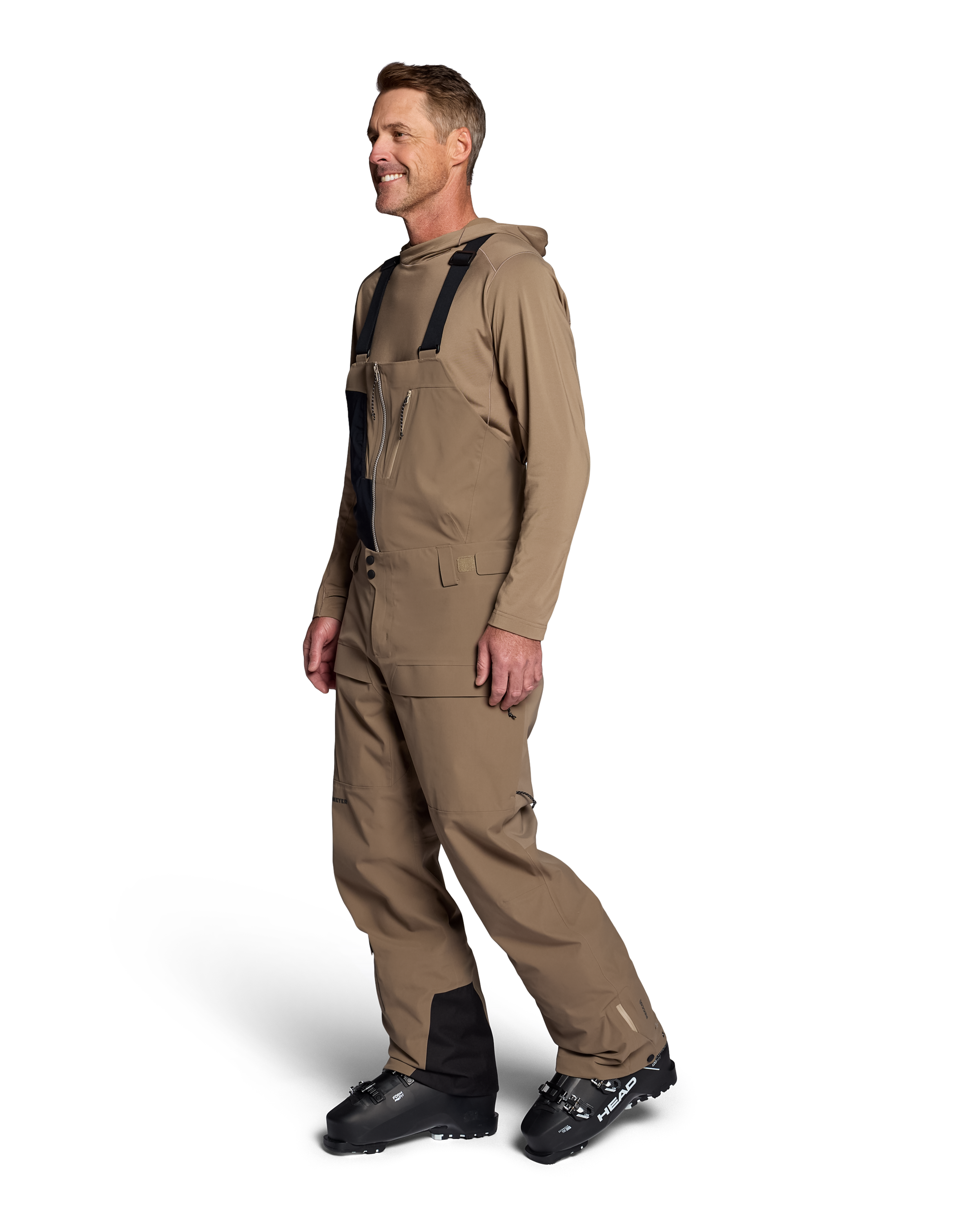 Men's mushroom shell bib pants with dark navy side bib and adjustable straps