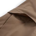 Men's mushroom shell bib pants close-up of reinforced fabric panel and stitched seam