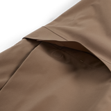 Men's mushroom shell bib pants close-up of reinforced fabric panel and stitched seam