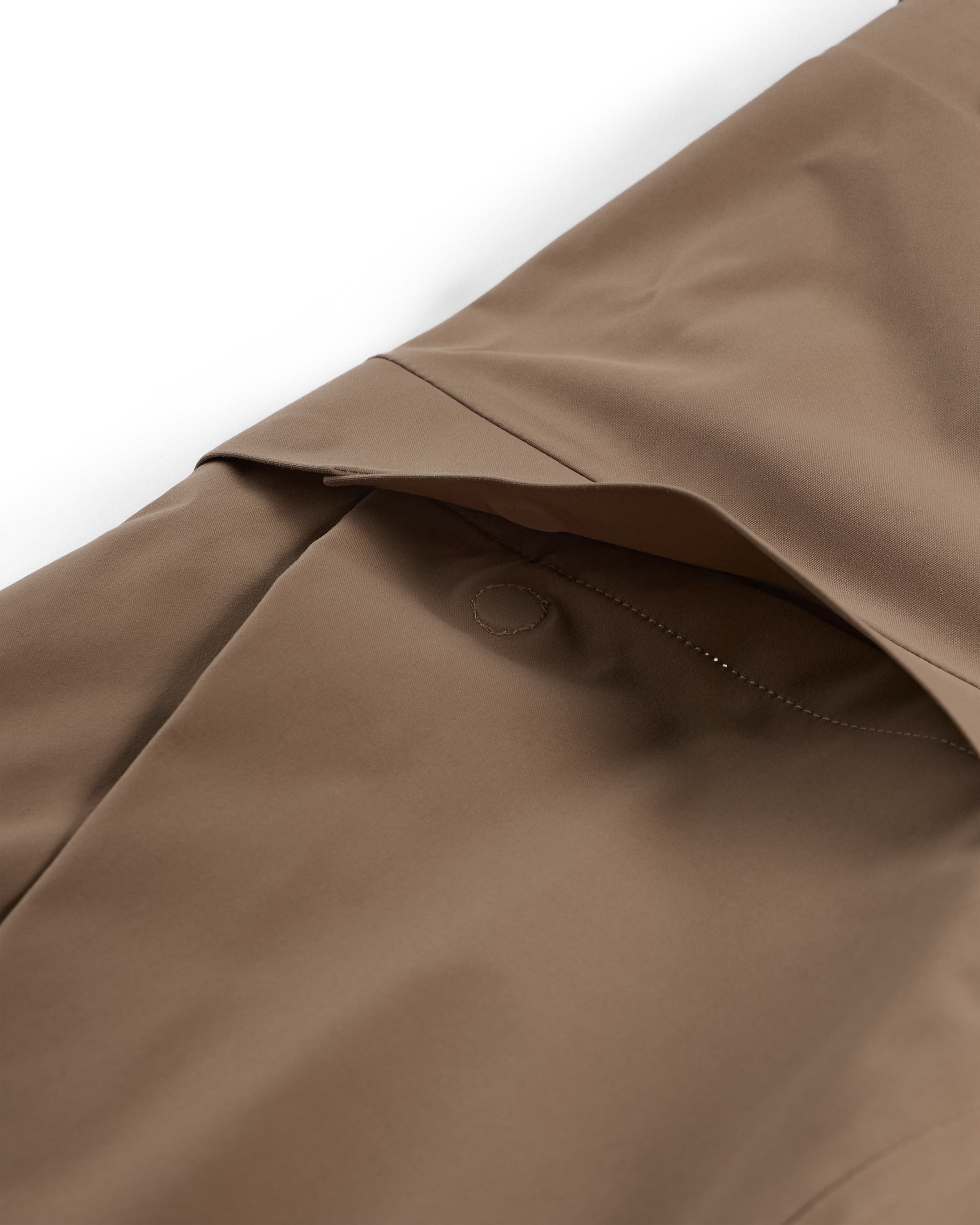 Men's mushroom shell bib pants close-up of reinforced fabric panel and stitched seam