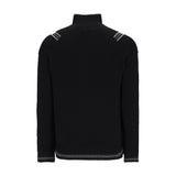 Obermeyer Gambel Half Zip Sweater 2025 - A black half-zip sweater with a zippered chest pocket and ribbed cuffs, collar, and hem.