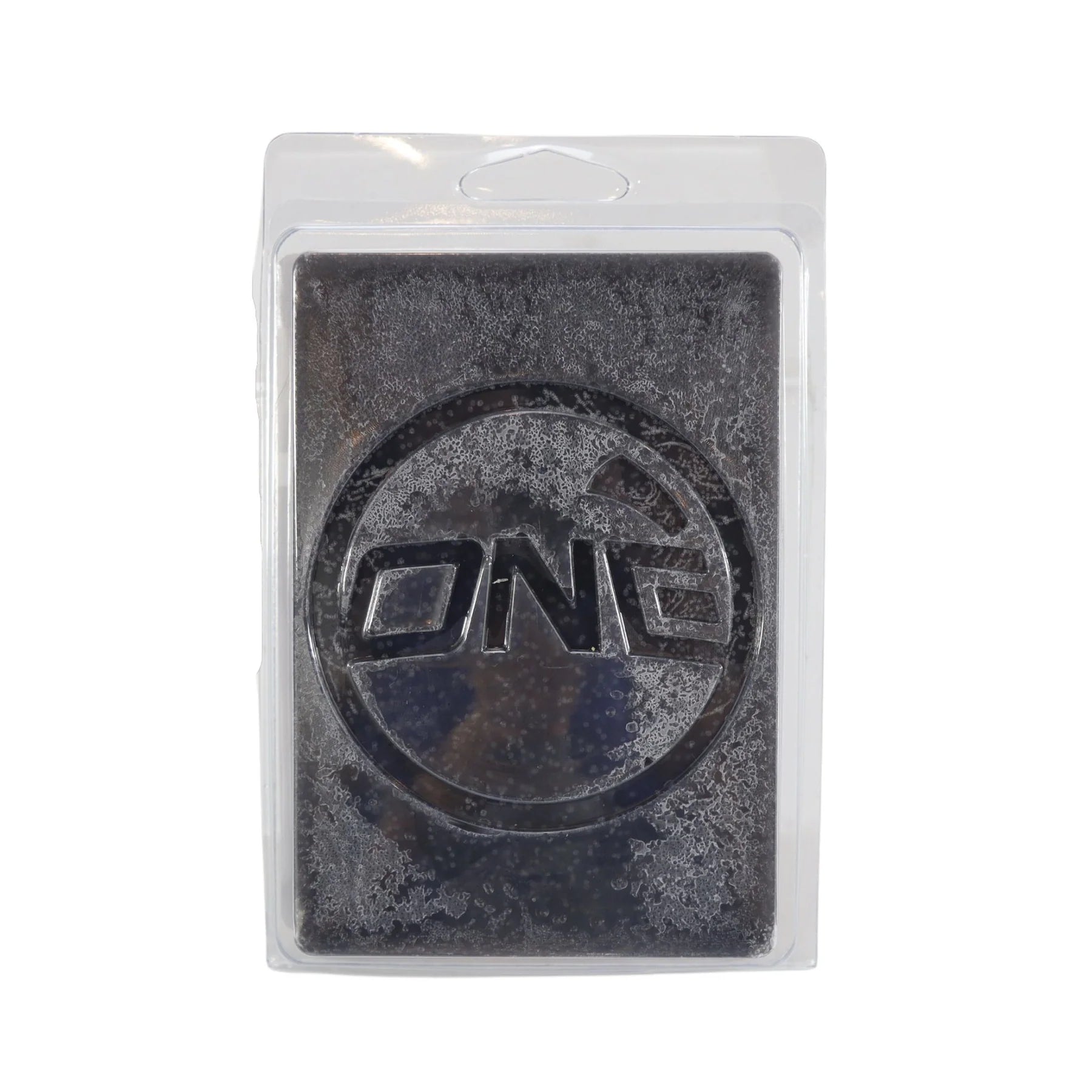 Oneball X-Wax Ice Cold 12F 2025 - A dark gray wax with a subtle sheen, featuring a circular logo at its center.