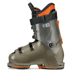 Tecnica Junior Mach 1 Ski Boot 2026 - A pair of junior ski boots with a predominantly black and orange color scheme, featuring a mix of smooth and textured surfaces, and a prominent Tecnica logo on the side.