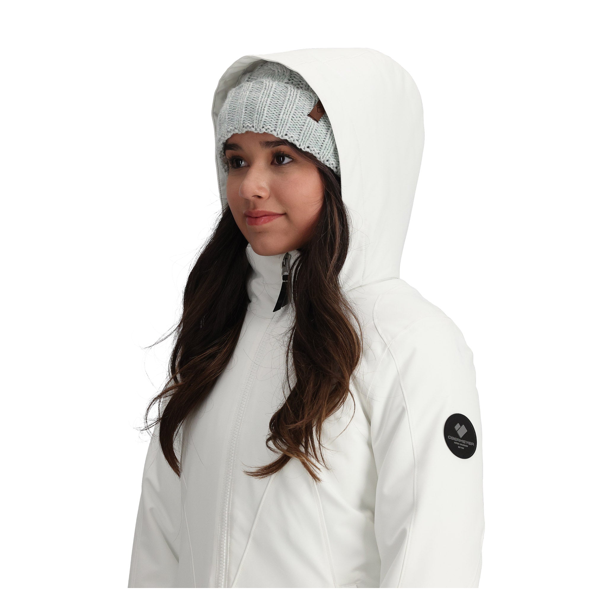 Obermeyer Teen Girls' Rylee Insulated Jacket 2025 - A white jacket with a hood, featuring a black zipper and a brown leather tag on the left shoulder.
