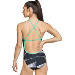 Speedo Infinite Pulse Crossback One Piece Swimsuit - A black swimsuit with a white and green geometric pattern, featuring a cross-back design.