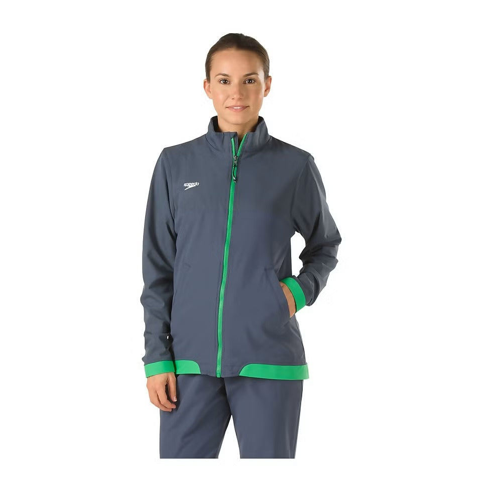 Speedo Female Tech Warm Up Jacket - A navy blue jacket with a white logo on the left chest and two zippered pockets at the waist.