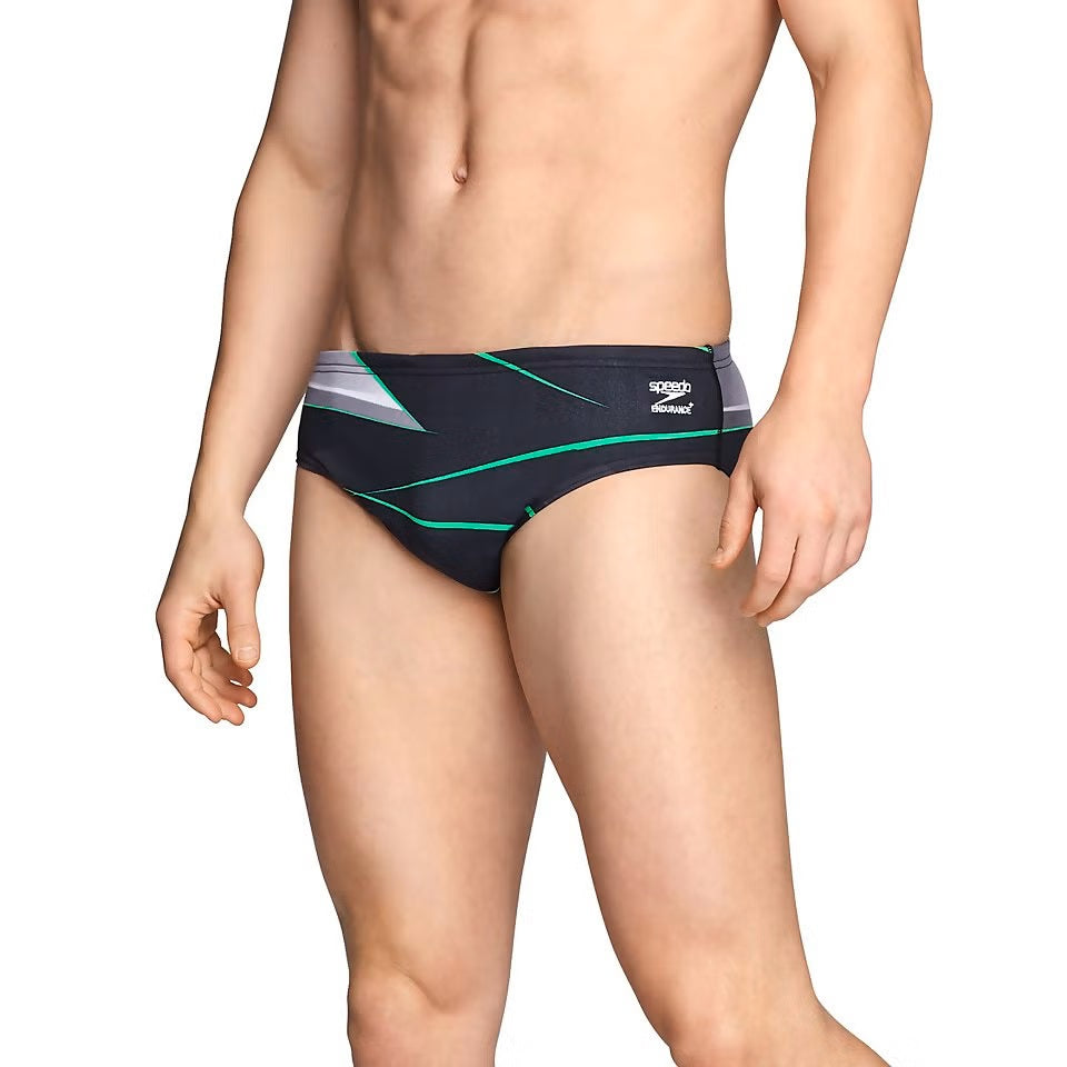 Speedo Infinite Pulse Brief Swimsuit - A black swimsuit with a geometric pattern of neon green and grey lines.