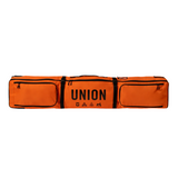 Union Wheeled Snowboard Bag - A large, rectangular bag with a black handle and wheels on one end, featuring a zippered opening at the top.