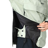 Beyond Medals Anorak 2L Shell Jacket 2024 - A black jacket with a white logo on the left chest and two zippered pockets on either side.