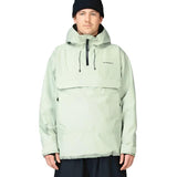Beyond Medals Anorak 2L Shell Jacket 2024 - A light green jacket with a hood, zippered chest pocket and adjustable cuffs.