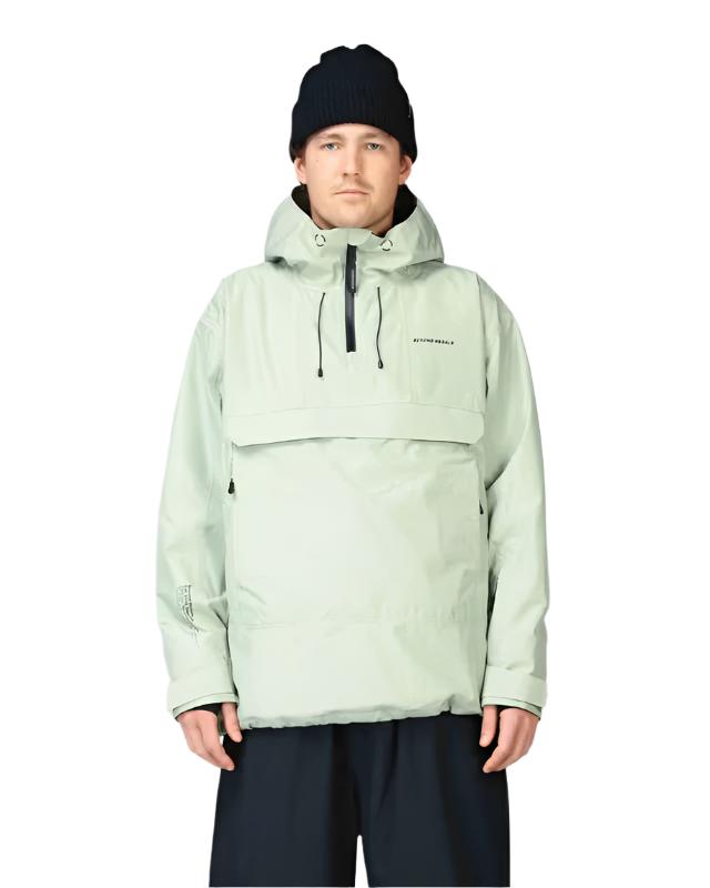 Beyond Medals Anorak 2L Shell Jacket 2024 - A light green jacket with a hood, zippered chest pocket and adjustable cuffs.