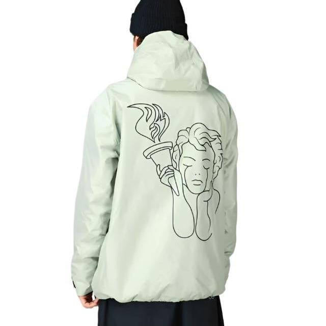 Beyond Medals Anorak 2L Shell Jacket 2024 - A light green jacket with a hood, featuring a graphic of an athlete holding a torch on the back.