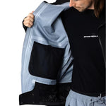 Beyond Medals Tech Shell Jacket 3L 2025 - A black jacket with a zippered chest pocket and reflective logo on the left breast.