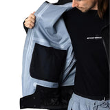 Beyond Medals Tech Shell Jacket 3L 2025 - A black jacket with a zippered chest pocket and reflective logo on the left breast.