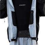 Beyond Medals Tech Shell Jacket 3L 2025 - A black jacket with a white logo on the chest and two zippered pockets on either side.