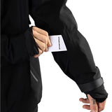 Beyond Medals - A black jacket with a white logo on the left chest and a zippered pocket on the right side.