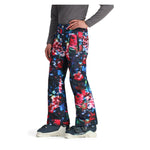 Obermeyer Girl's Brooke Print Pant 2025 - A pair of girls' snow pants with a colorful abstract print featuring red, blue, green, and white shapes on a black background.