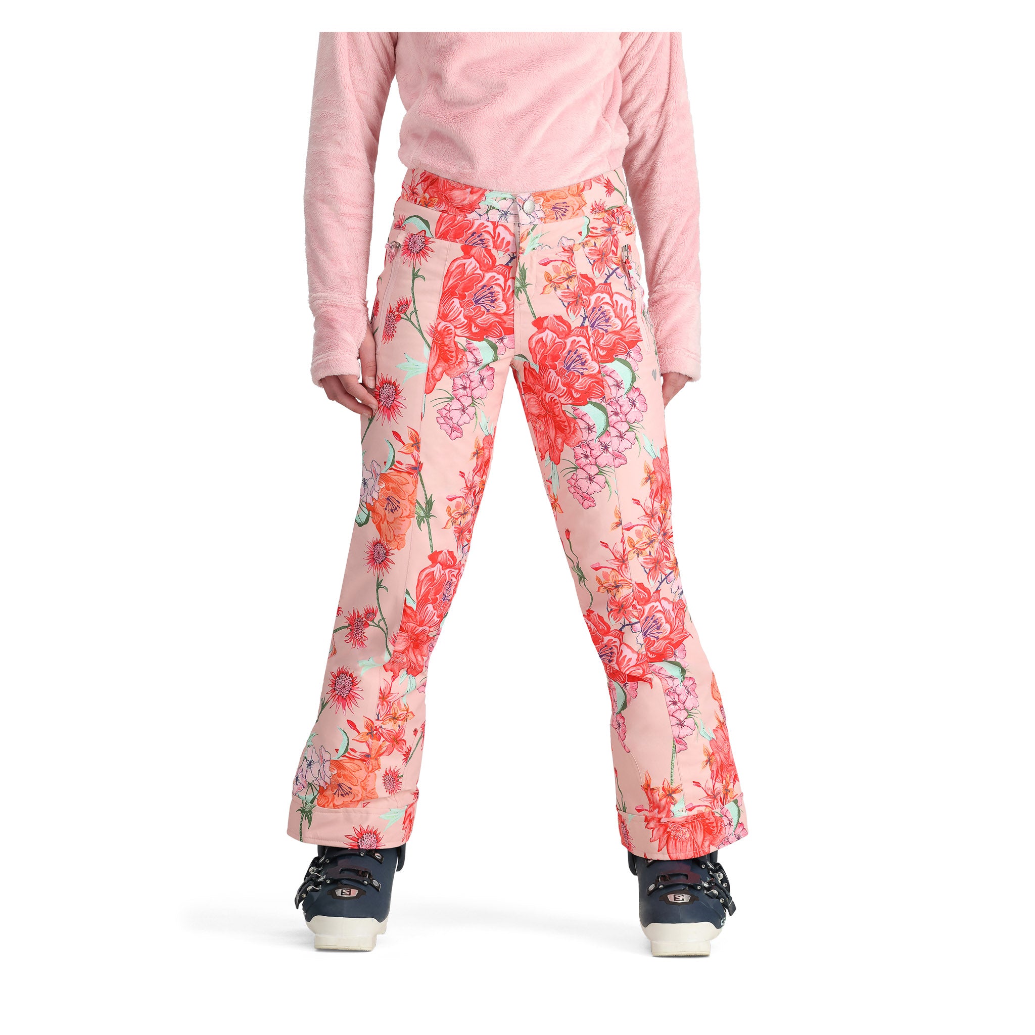 Obermeyer Girl's Brooke Print Pant 2025 - A pair of pink snow pants with a floral pattern featuring red, orange, and green flowers.