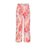 Obermeyer Girl's Brooke Print Pant 2025 - A pair of pink pants with a floral pattern featuring red and orange flowers.