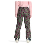 Obermeyer Girl's Brooke Print Pant 2025 - A pair of green snow pants with a purple and white abstract pattern.