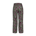 Obermeyer Girl's Brooke Print Pant 2025 - A pair of green ski pants with a purple and black abstract pattern.