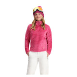 Obermeyer Girl's Furry Fleece Top - A bright pink fleece top with a high collar and zipper closure, featuring a small white logo on the bottom right side of the chest.