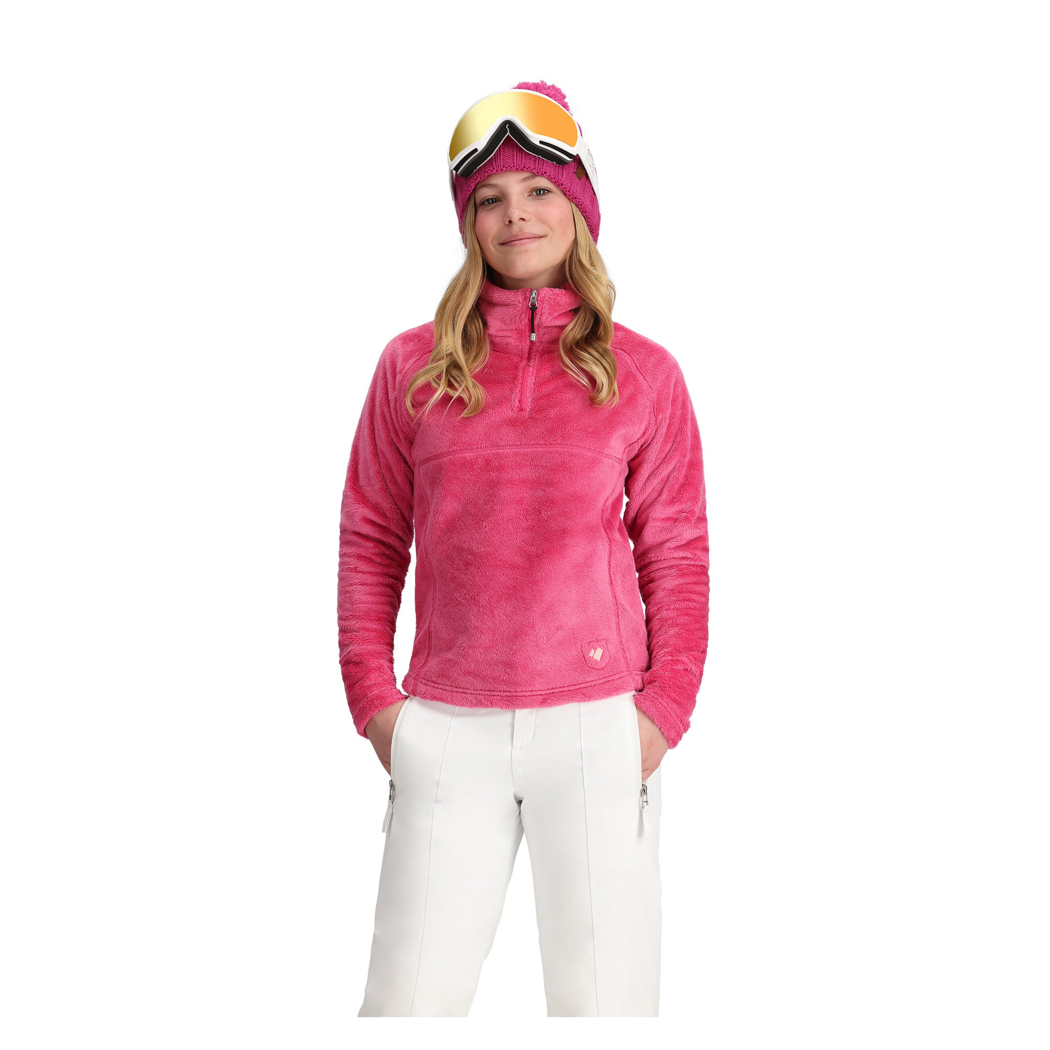 Obermeyer Girl's Furry Fleece Top - A bright pink fleece top with a high collar and zipper closure, featuring a small white logo on the bottom right side of the chest.