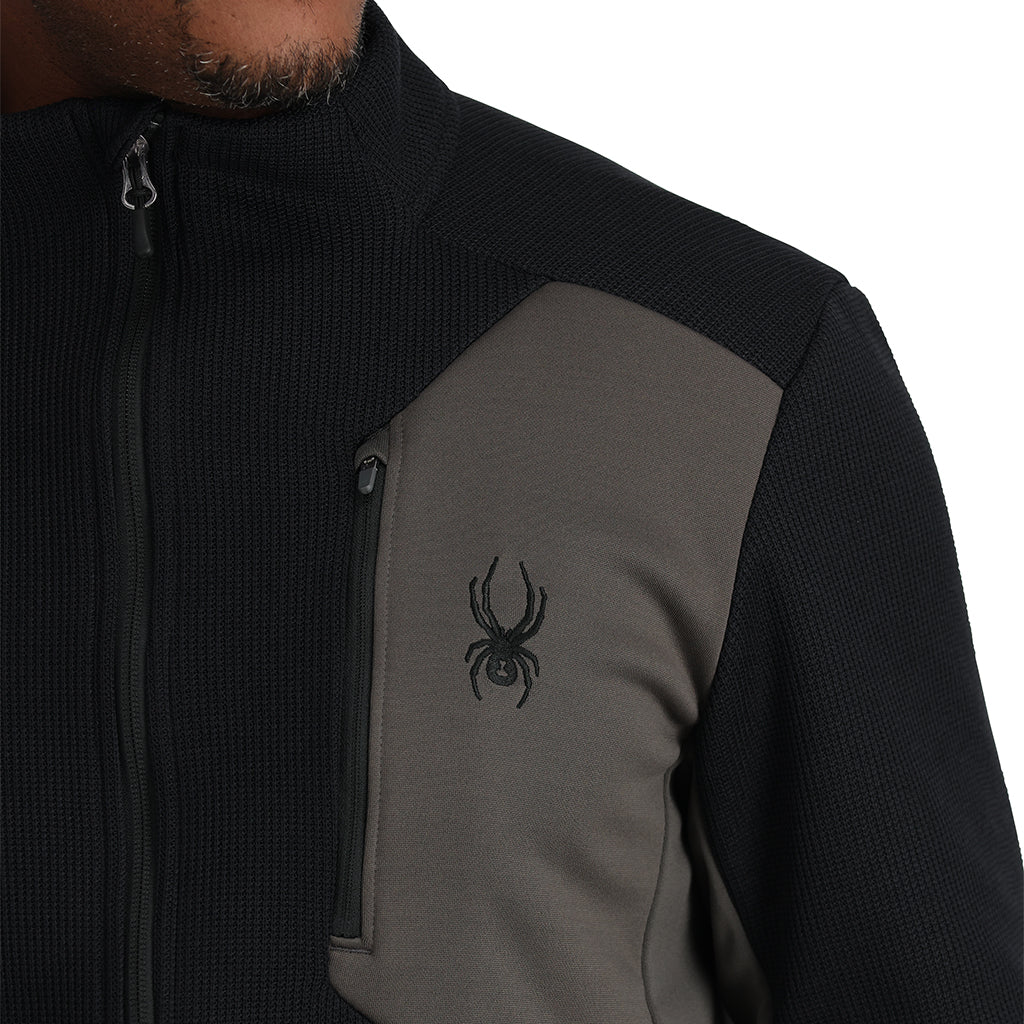 Spyder Men's Bandit Full-Zip Fleece Jacket 2025 - A black fleece jacket with a zippered front and two pockets on either side.