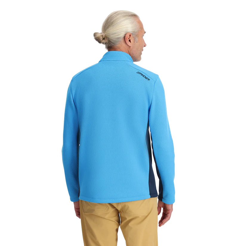 Spyder Men's Bandit 1/2 Zip Top - A light blue zip-up top with a collar and two chest pockets, featuring a black zipper on the front.
