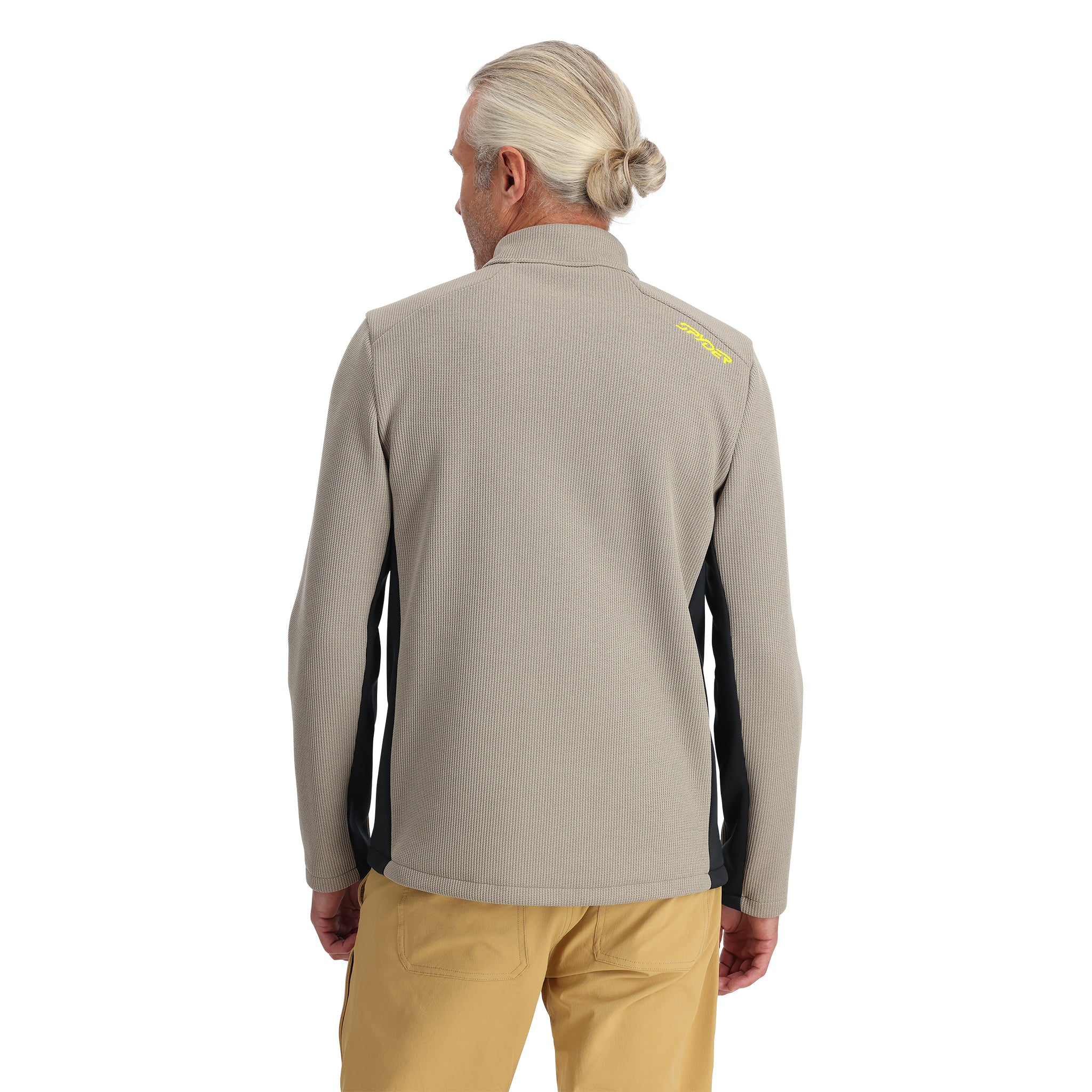 Spyder Men's Bandit 1/2 Zip Top - A gray zip-up top with a black zipper and two pockets on either side of the waistband.