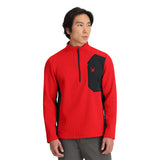 Spyder Men's Bandit 1/2 Zip Top - A red and black half-zip top with a zippered chest pocket featuring a spider logo in red.