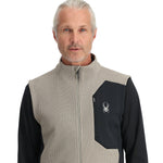 Spyder Men's Bandit Fleece Vest - A black fleece vest with a white Spyder logo on the left chest and two zippered pockets on either side.