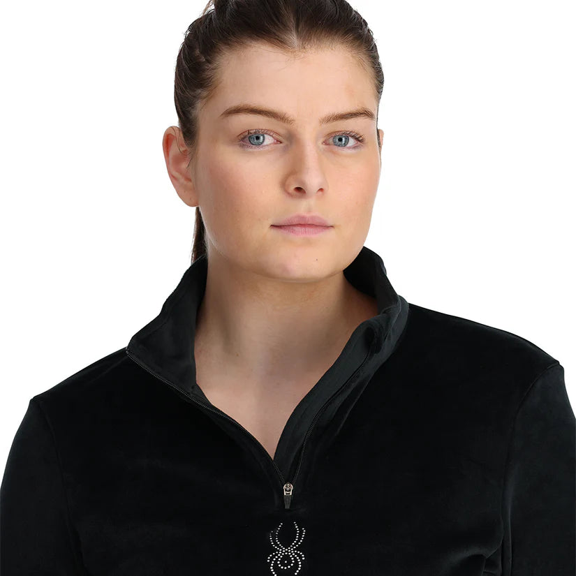 Spyder Women's Shimmer Bug 1/2 Zip Fleece 2025 - A black fleece jacket with a zipper and a shimmering pattern on the front.