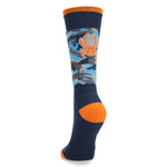 Spyder Boys' Sweep Ski Socks 2025 - A pair of navy blue ski socks with a gray and white patterned design on the top portion.