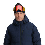 Spyder Bromont Insulated Jacket 2025 - A navy blue jacket with a black zipper and two zippered pockets on the chest.