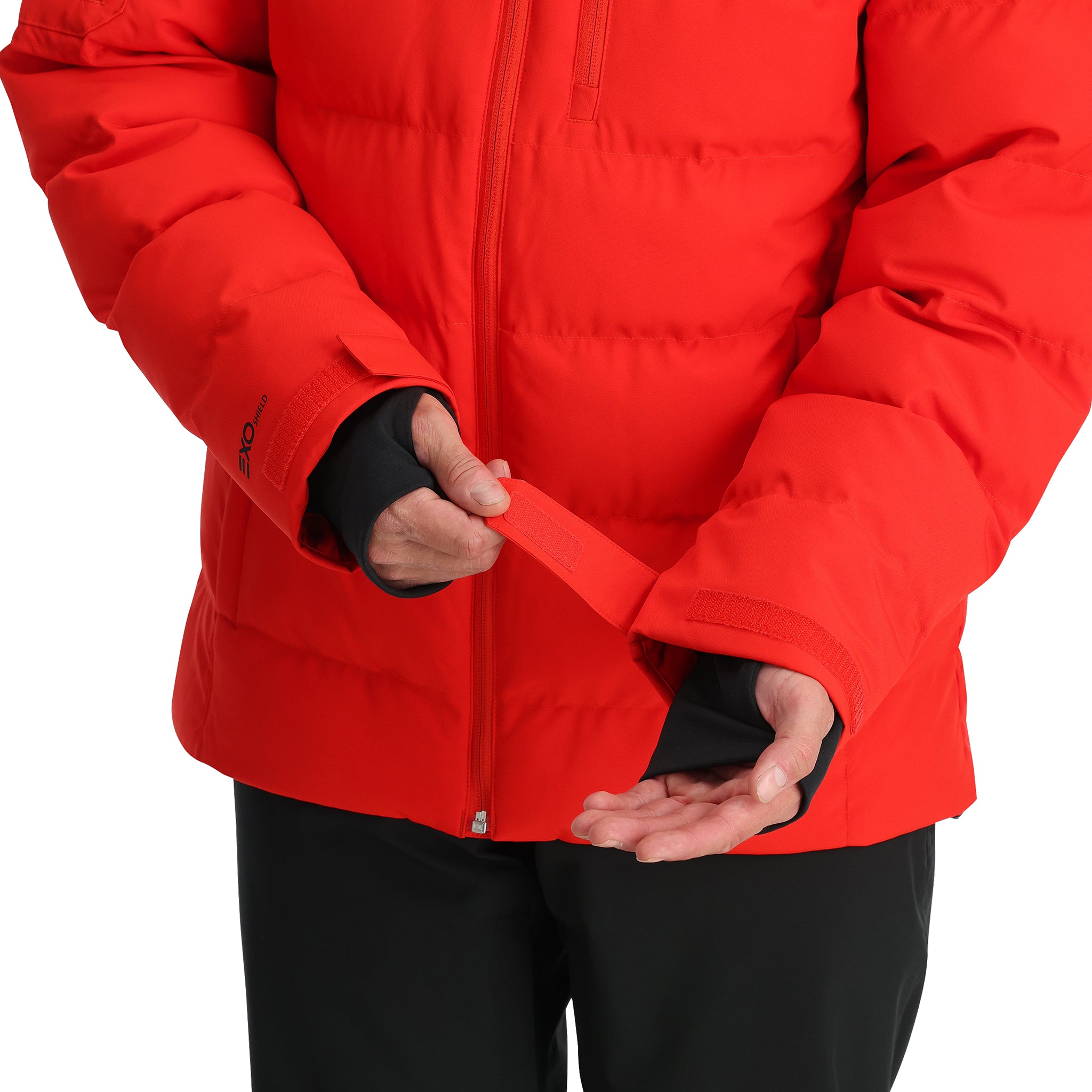 Spyder Bromont Insulated Jacket - A red jacket with a black zipper and two zippered pockets on either side.