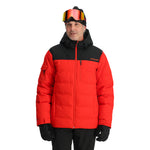 Spyder Bromont Insulated Jacket 2025 - A red insulated jacket with a black chest panel and hood, featuring two zippered pockets on the front.