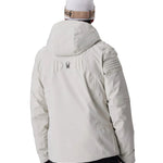 Light grey insulated ski jacket with hood, back view, zipper pockets and panel seams.